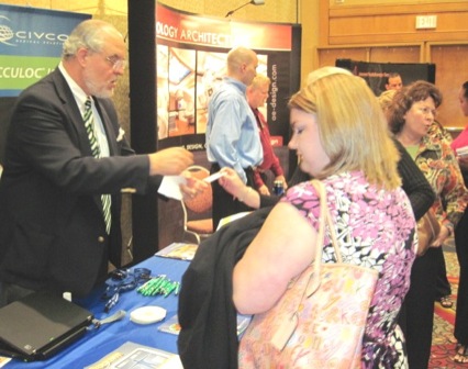 Thomas Rea, AmerOnc, with meeting attendees